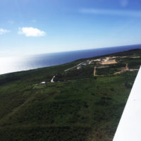 上空から見たテニアン島。緑が島を覆っている。